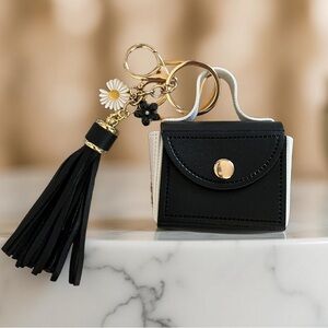 Chic Black & White Mini Purse Keychain with Flower & Tassel Accents